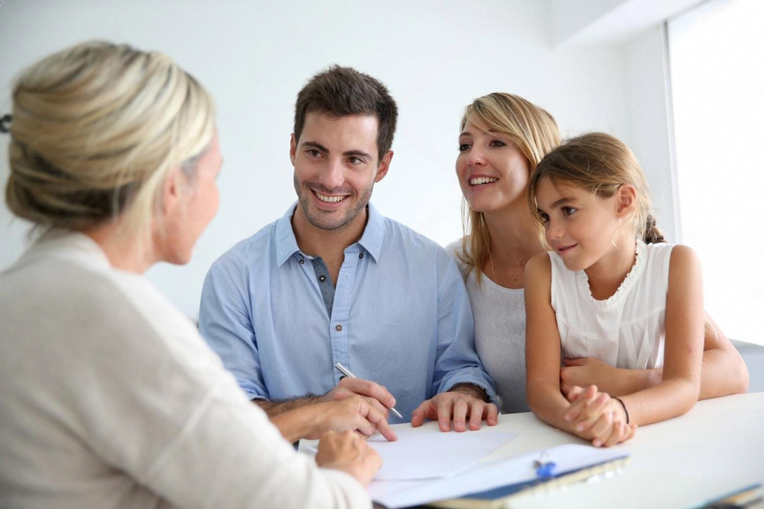 Young family meeting an advisor to discuss estate planning in the UAE